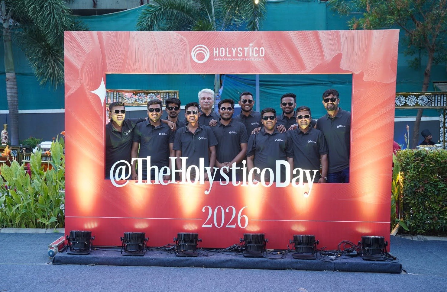 The Holystico Day Photo Corner with team members